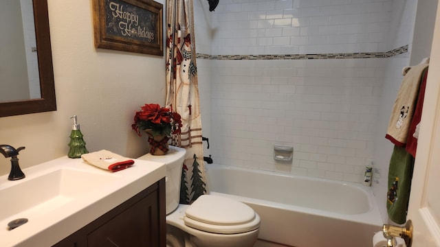 full bathroom with shower / bath combination with curtain, vanity, and toilet