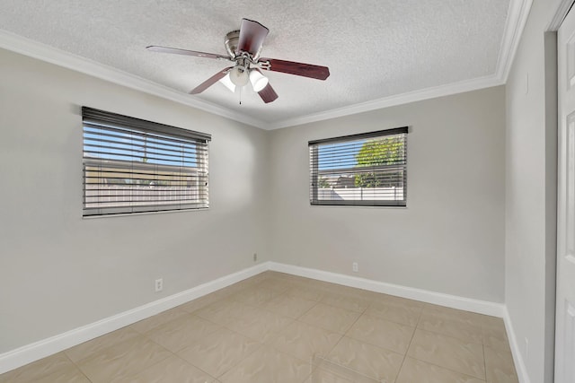 spare room featuring ceiling fan, a textured ceiling, and ornamental molding