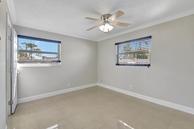 tiled empty room with a textured ceiling, ceiling fan, and crown molding