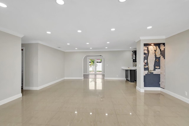 interior space featuring crown molding and light tile patterned floors