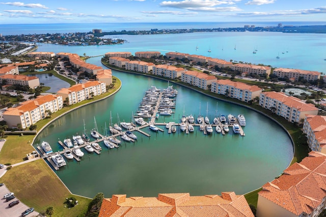 drone / aerial view with a water view