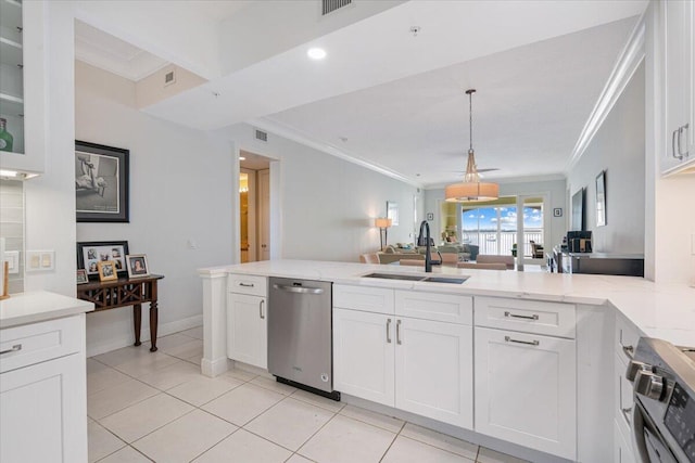 kitchen featuring white cabinetry, sink, appliances with stainless steel finishes, and ornamental molding