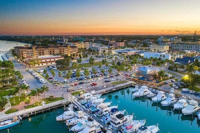 aerial view at dusk with a water view