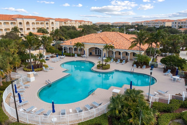 view of pool featuring a patio