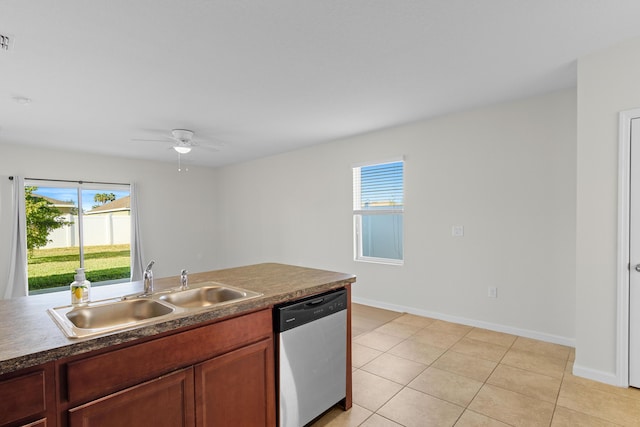 kitchen featuring stainless steel dishwasher, ceiling fan, light tile patterned floors, and sink