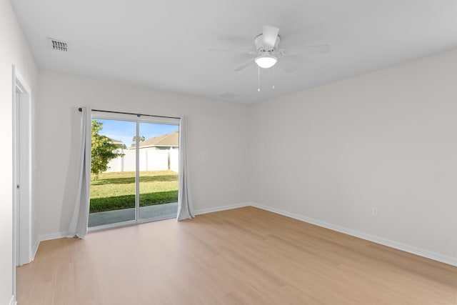 unfurnished room with ceiling fan and light hardwood / wood-style floors