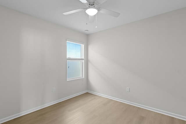 unfurnished room featuring ceiling fan and light hardwood / wood-style flooring