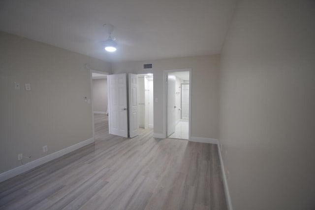 unfurnished bedroom featuring light hardwood / wood-style flooring