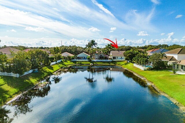 bird's eye view with a water view