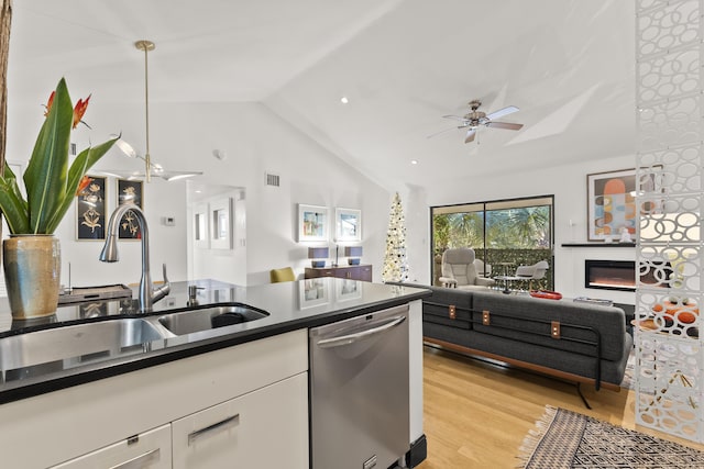 kitchen with ceiling fan, dishwasher, sink, white cabinets, and light wood-type flooring