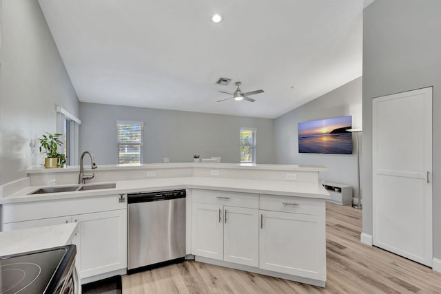 kitchen with white cabinetry, light hardwood / wood-style flooring, and stainless steel appliances