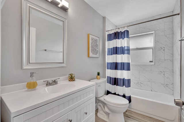 full bathroom with wood-type flooring, vanity, toilet, and shower / bath combo with shower curtain