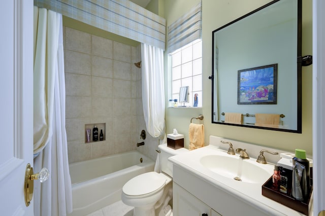 full bathroom with shower / bathtub combination with curtain, vanity, and toilet