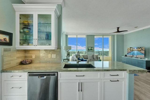 bar with stainless steel dishwasher, ceiling fan, sink, light hardwood / wood-style floors, and white cabinetry