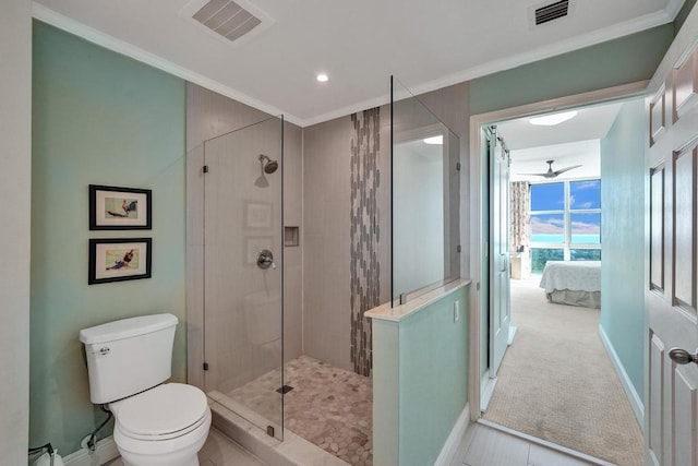 bathroom featuring toilet, an enclosed shower, crown molding, and ceiling fan