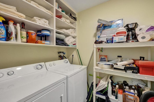 laundry room featuring washer and clothes dryer