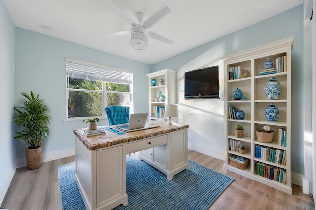 office area featuring ceiling fan and light wood-type flooring