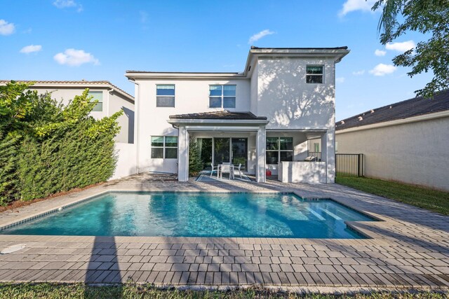 view of swimming pool featuring a patio