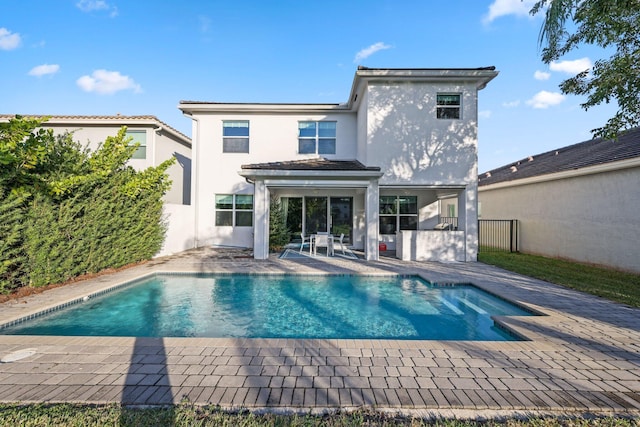 rear view of house featuring a patio area