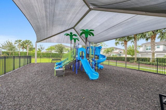 community jungle gym featuring fence