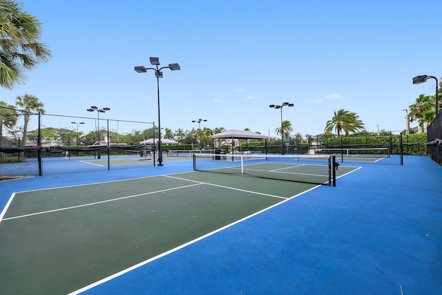 view of sport court with fence