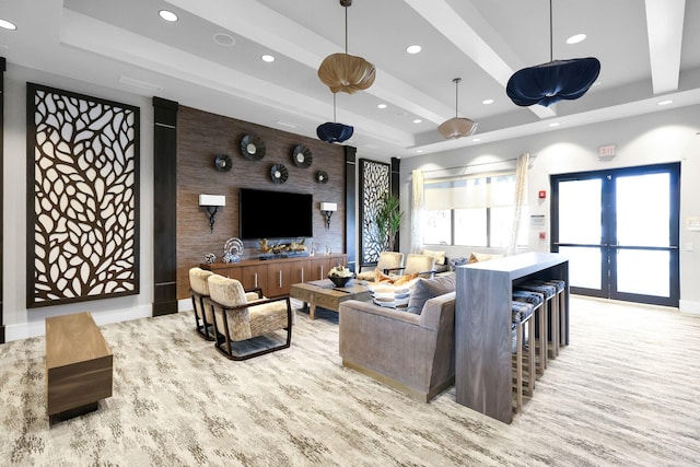 living room with baseboards, french doors, a raised ceiling, and recessed lighting