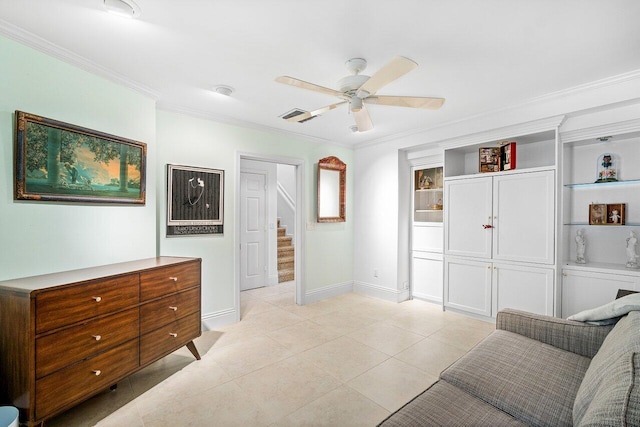 sitting room featuring crown molding, ceiling fan, and light tile patterned floors