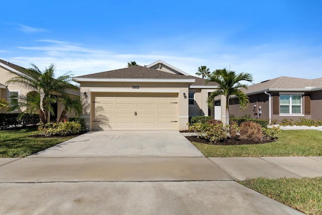 ranch-style home featuring a front yard and a garage