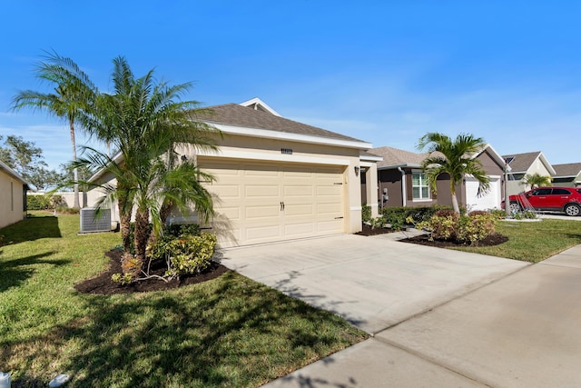 single story home featuring a front yard and a garage