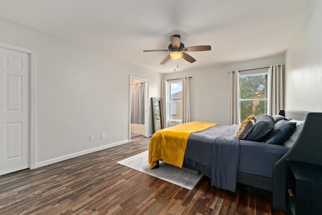 bedroom featuring dark hardwood / wood-style flooring and ceiling fan