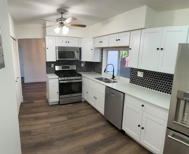 kitchen with sink, white cabinets, and stainless steel appliances