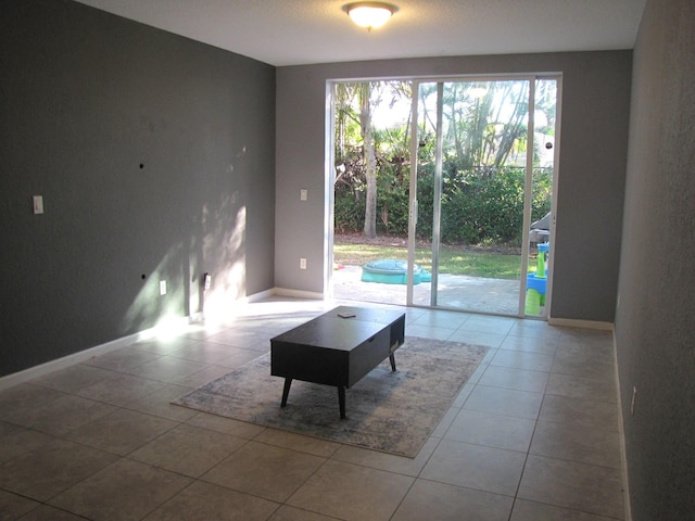 living room with light tile patterned flooring