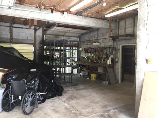 garage featuring a workshop area