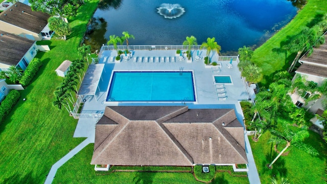 birds eye view of property featuring a water view