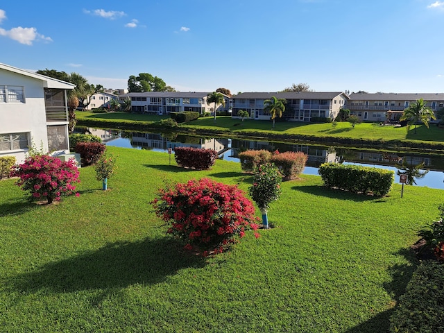 view of yard with a water view