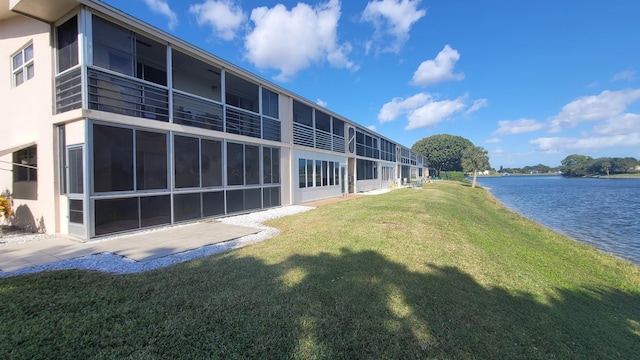 exterior space with a water view