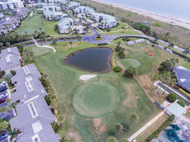 bird's eye view with a view of the beach and a water view