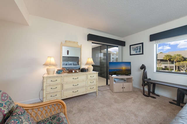 2400 S Ocean Dr Unit 6523, Fort Pierce, FL 34949 - living area with light colored carpet, a textured ceiling, and baseboards