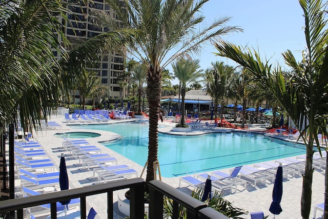2400 S Ocean Dr Unit 6523, Fort Pierce, FL 34949 - community pool with a community hot tub and a patio