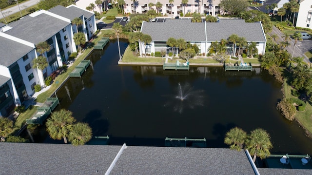 bird's eye view with a water view