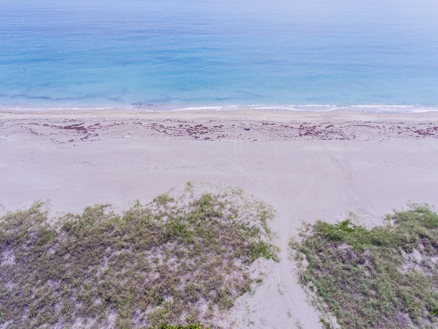 property view of water featuring a view of the beach