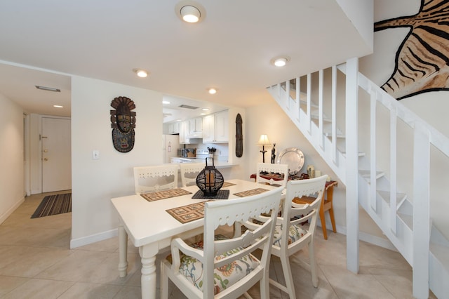 dining space with light tile patterned floors