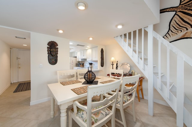 2400 S Ocean Dr Unit 6523, Fort Pierce, FL 34949 - dining area featuring stairs, light tile patterned floors, recessed lighting, and baseboards