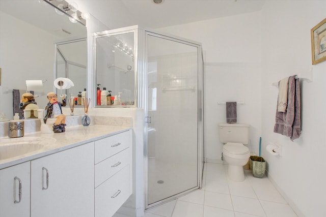 bathroom with walk in shower, tile patterned flooring, vanity, and toilet