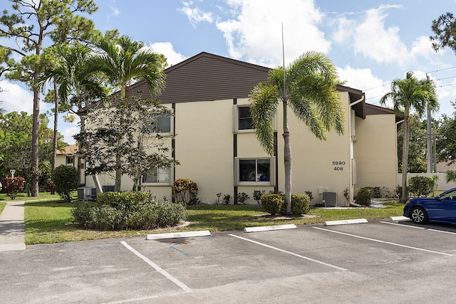 view of building exterior featuring central AC