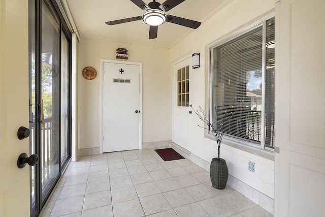 exterior space with plenty of natural light and ceiling fan