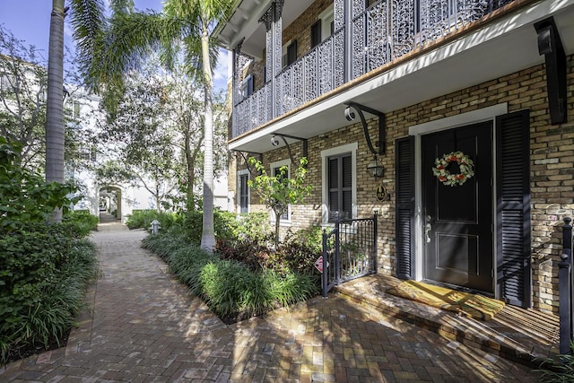 doorway to property featuring a balcony