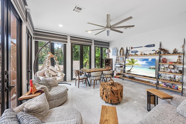 living room featuring ceiling fan