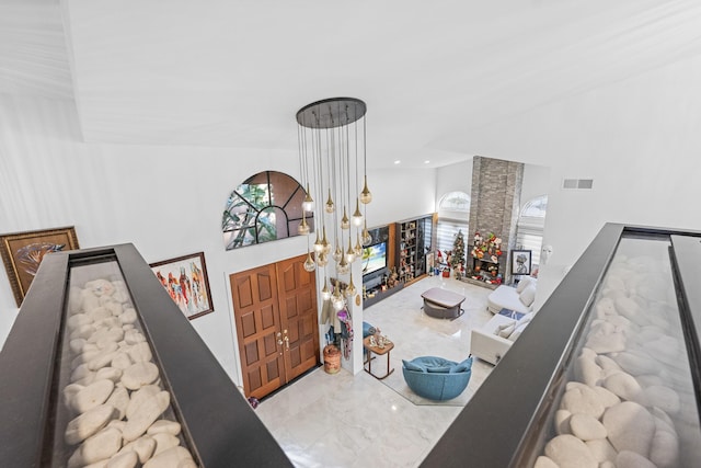 living room with an inviting chandelier