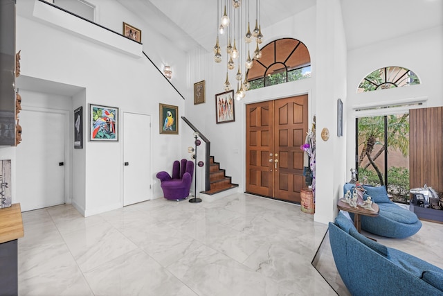 entrance foyer featuring a high ceiling